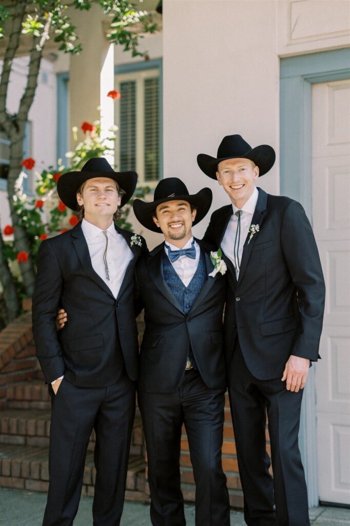 Custom hand tailored wedding party suites by Devan Vincent. Cared for by Martinizing Dry Cleaners.